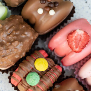 Colored macaroons with decoration for those with a sweet tooth close up