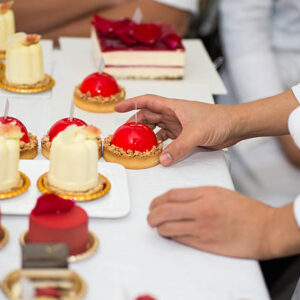There are flowers on the french dessert cake