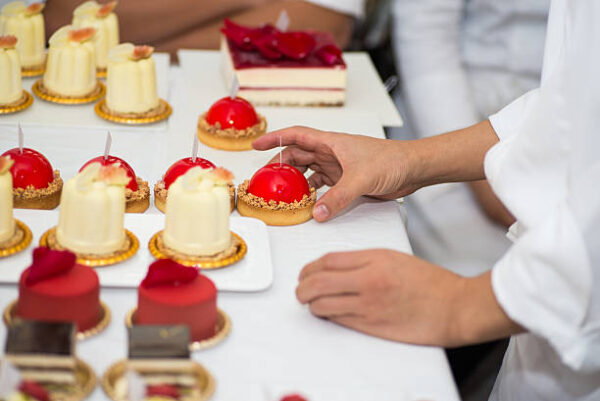 There are flowers on the french dessert cake